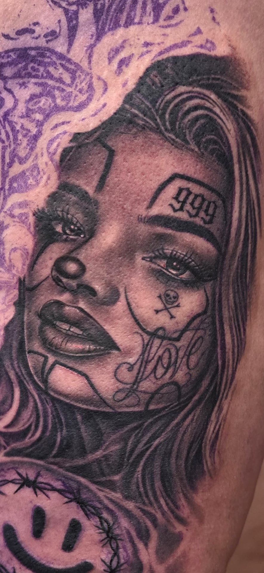 Chicano-style woman portrait with 999 forehead detail